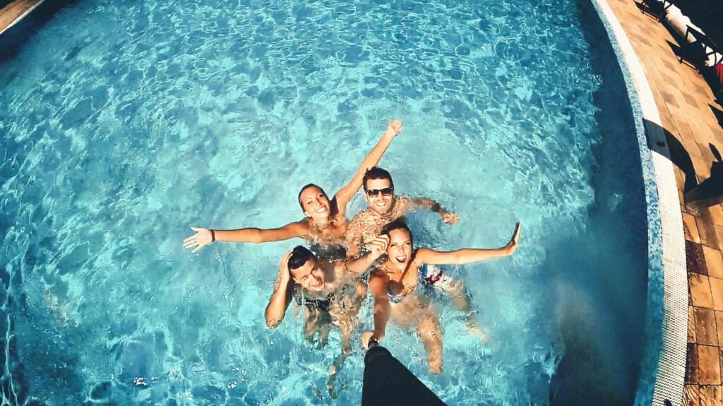 Jacksonville pool photo ideas with colorful floats in spring